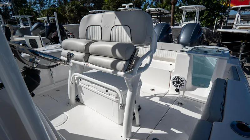 Slide: The Image of 2024 Sea Fox 268 Commander boat interior with cushioned seating and modern controls. - 31