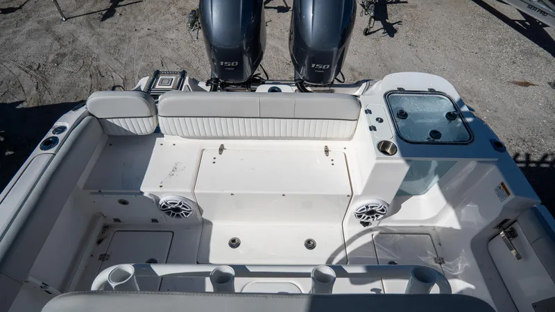 Slide: The Image of 2024 Sea Fox 268 Commander boat interior with dual engines and seating area. - 35