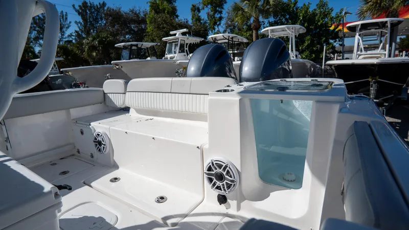 Slide: The Image of 2024 Sea Fox 268 Commander boat interior with dual engines and seating area. - 38
