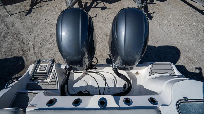 Slide: The Image of 2024 Sea Fox 268 Commander boat with dual outboard engines, rear view. - 41