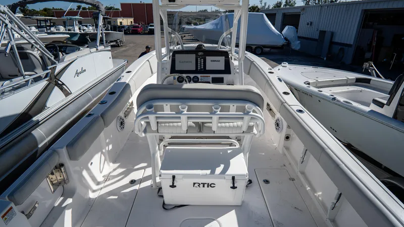 Slide: The Image of 2024 Sea Fox 268 Commander boat interior with RTIC cooler and navigation equipment. - 42