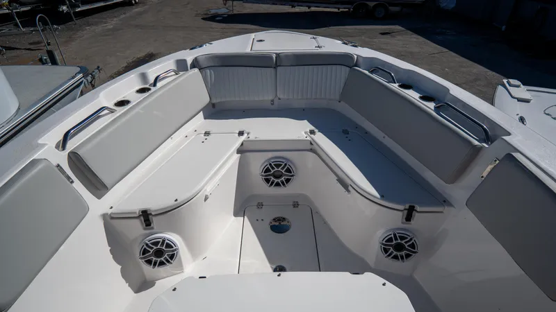 Slide: The Image of 2024 Sea Fox 268 Commander boat interior with spacious seating and built-in speakers. - 6