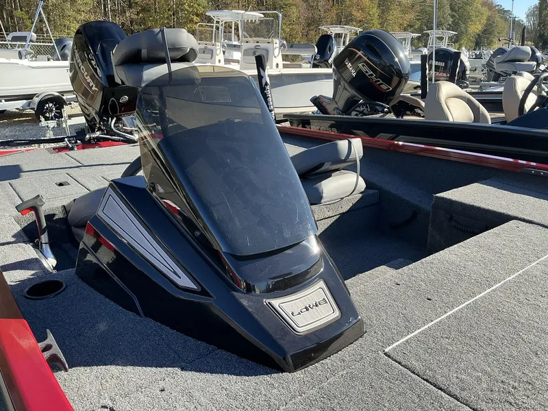 Slide: The Image of 2025 Lowe Stinger ST175 fishing boat with modern console and seating. - 6