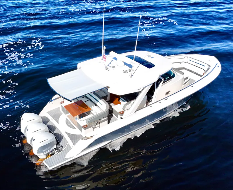 Slide: The Image of 2018 Tiara Yachts 38 LS cruising on open water. - 17