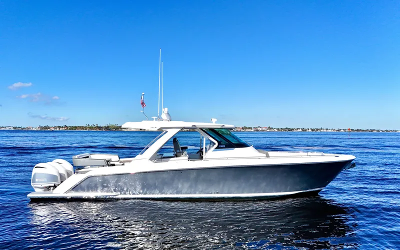 Slide: The Image of 2018 Tiara Yachts 38 LS cruising on a sunny day. - 27