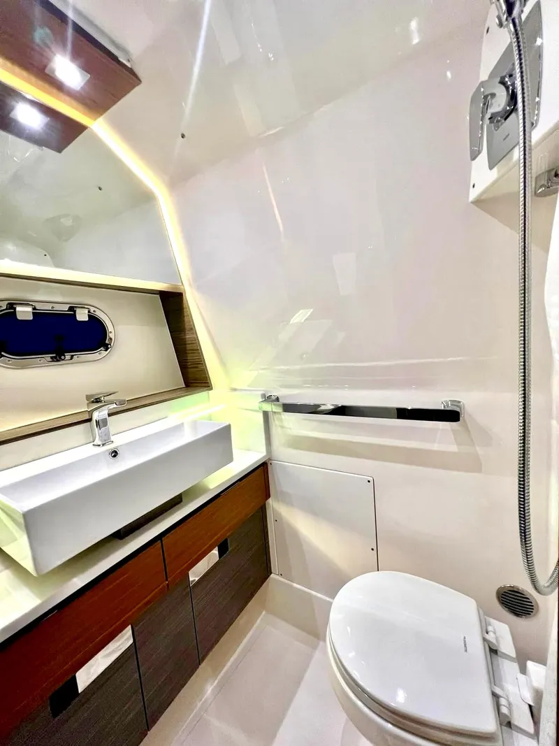 Slide: The Image of Luxurious bathroom interior of 2018 Tiara Yachts 38 LS with modern fixtures. - 34
