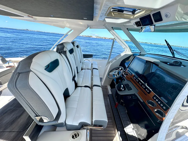 Slide: The Image of Interior of 2018 Tiara Yachts 38 LS with modern helm and seating. - 36