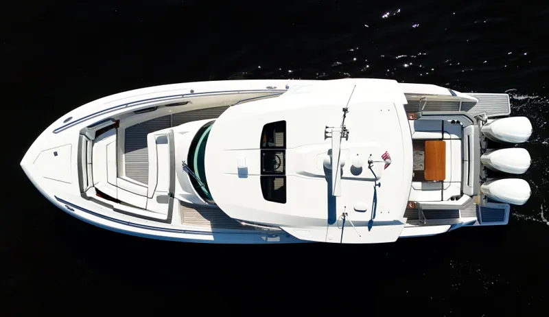 Slide: The Image of Aerial view of 2018 Tiara Yachts 38 LS on dark water. - 5