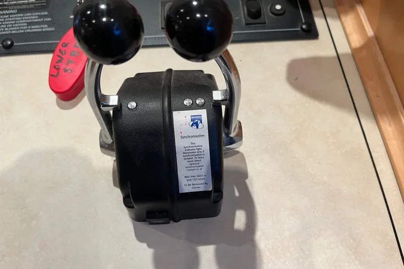 Slide: The Image of Dual throttle control levers on a Sharpe 75, 2001 model boat. - 45