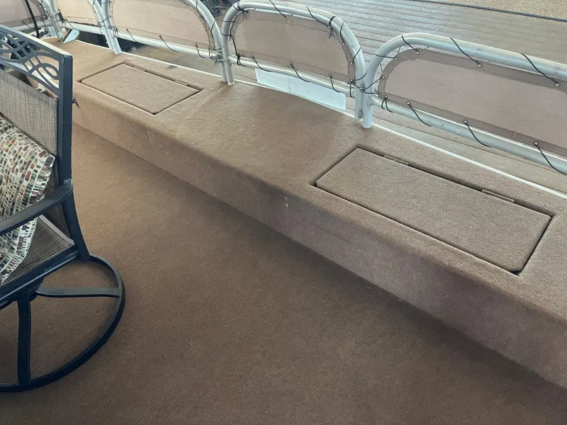 Slide: The Image of Carpeted seating area on a 2001 Sharpe 75 houseboat deck. - 5