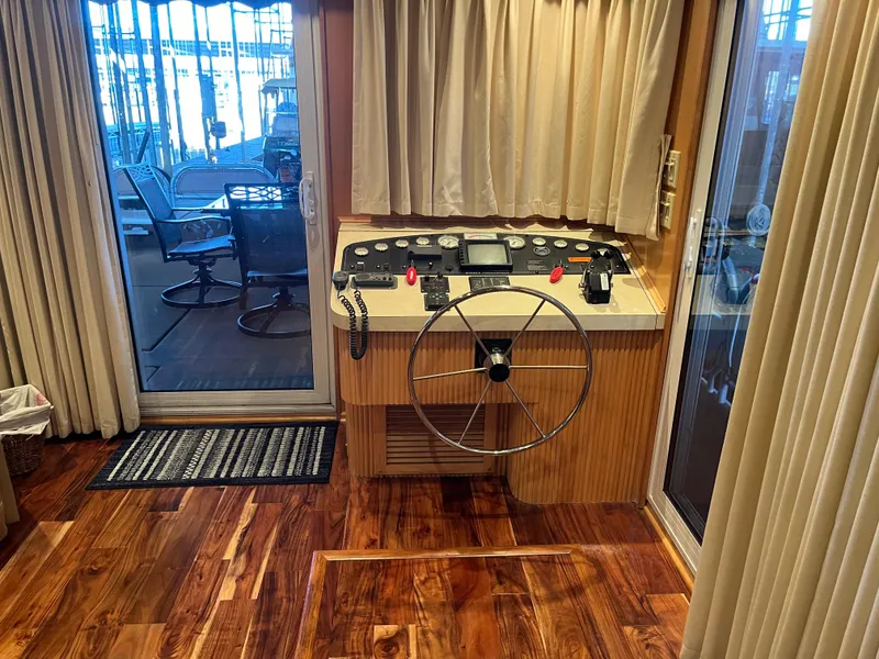 Slide: The Image of Sharpe 75 boat helm with wooden flooring and sliding glass door, 2001 model. - 7