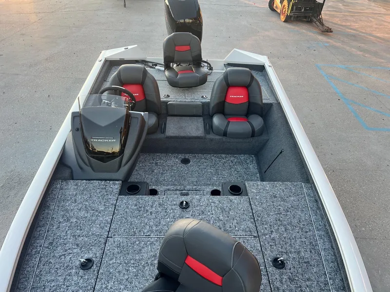 Slide: The Image of 2025 Tracker Pro Team 195 Tournament Edition boat interior with gray and red seating. - 3