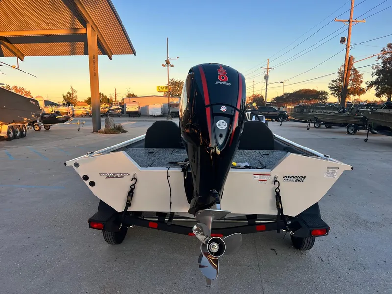 Slide: The Image of 2025 Tracker Pro Team 195 Tournament Edition boat with powerful outboard motor. - 8