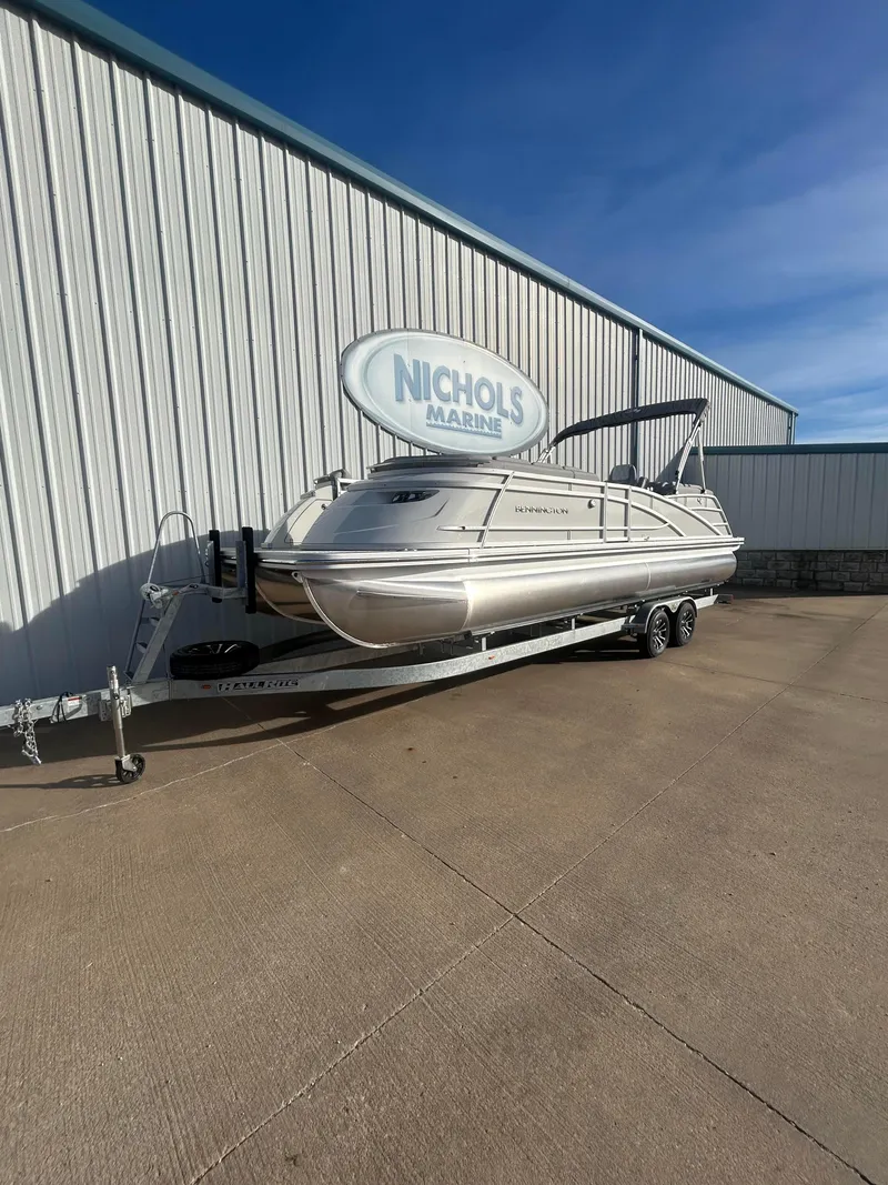 Slide: The Image of 2025 Bennington Q 27 pontoon boat on trailer at Nichols Marine. - 3