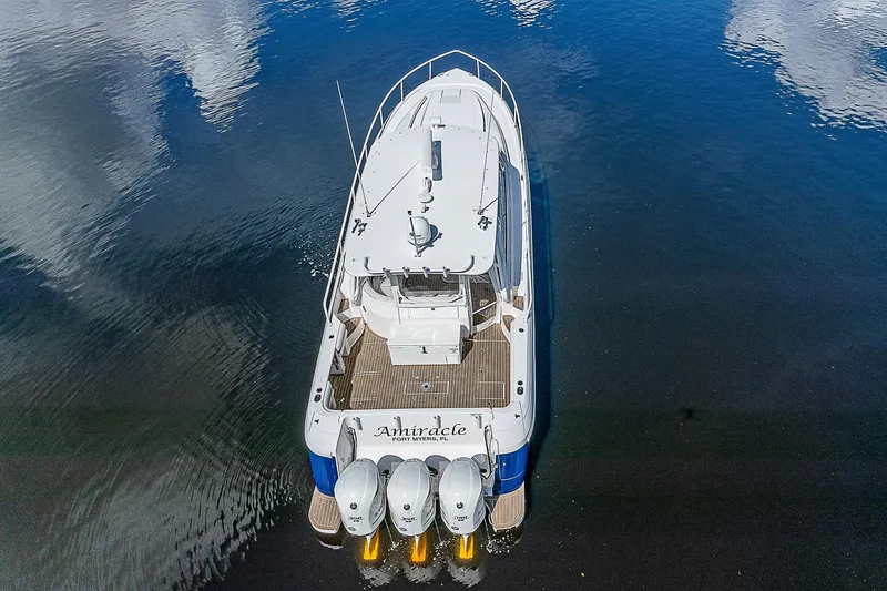 Slide: The Image of 2016 Intrepid 430 Sport Yacht on calm water, aerial view. - 15