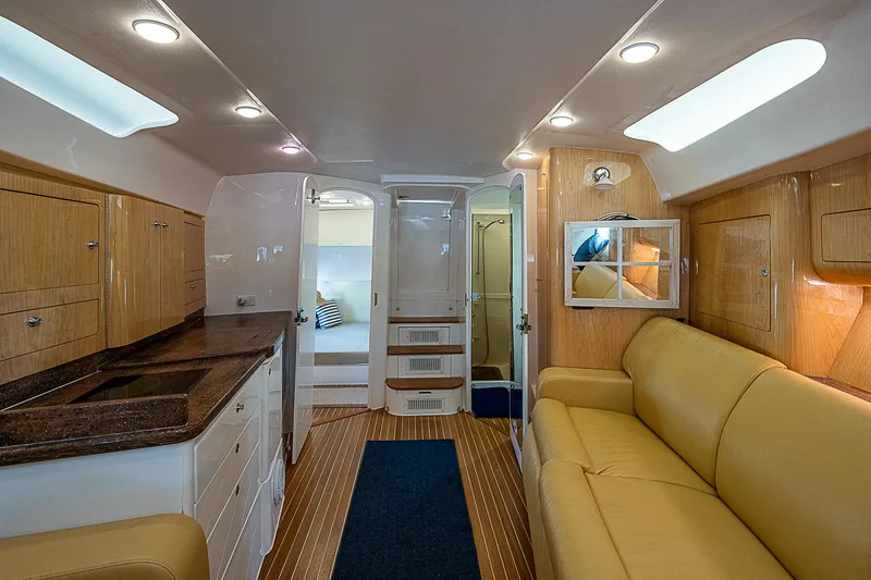 Slide: The Image of Luxurious interior of 2016 Intrepid 430 Sport Yacht with modern amenities and elegant design. - 24