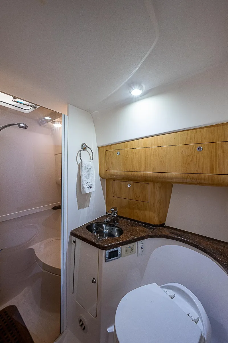 Slide: The Image of Bathroom interior of 2016 Intrepid 430 Sport Yacht with sink and shower. - 29