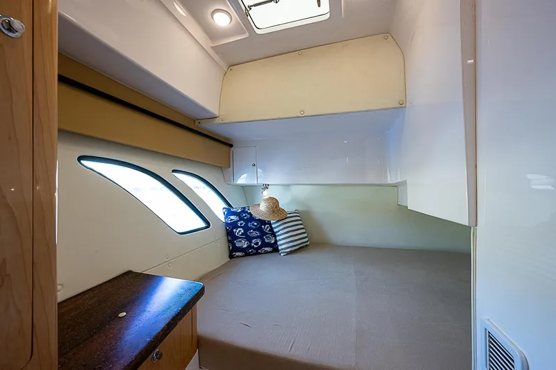 Slide: The Image of Interior cabin of 2016 Intrepid 430 Sport Yacht with cozy bedding and modern design. - 31