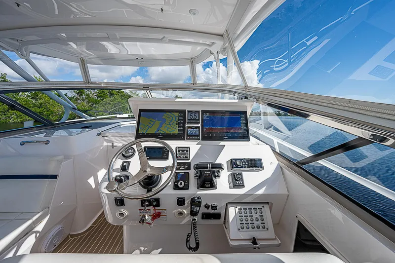 Slide: The Image of Helm of 2016 Intrepid 430 Sport Yacht with advanced navigation systems. - 49