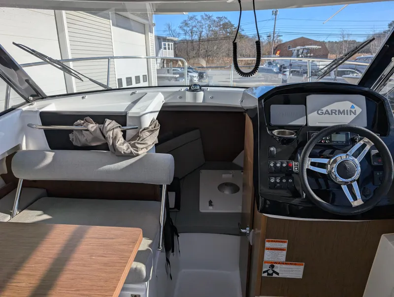 Slide: The Image of Interior of 2020 Jeanneau NC 795 boat with Garmin navigation system. - 30