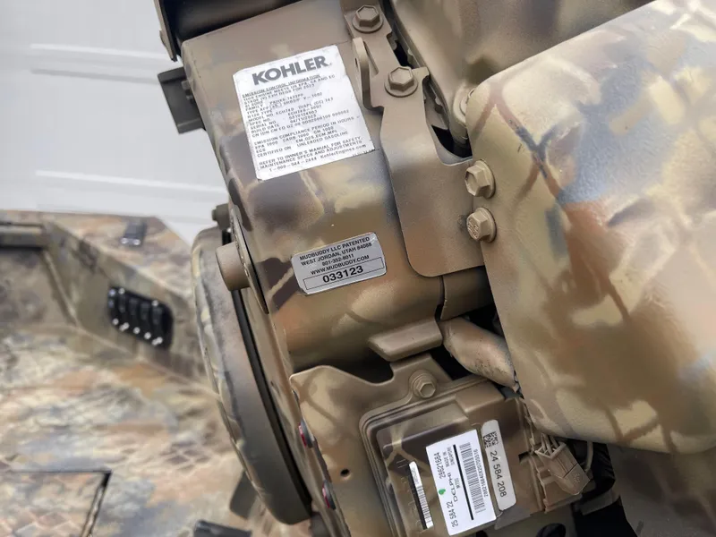 Slide: The Image of Close-up of a Kohler engine in a 2025 Excel Eclipse vehicle. - 18