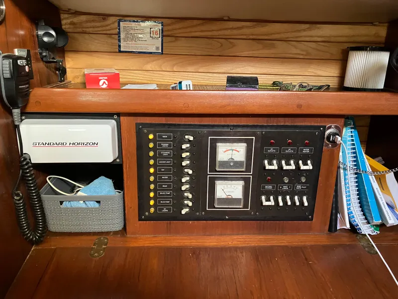 Slide: The Image of Control panel of a 1983 Morgan Nelson Marek 454 sailboat with radio and gauges. - 12