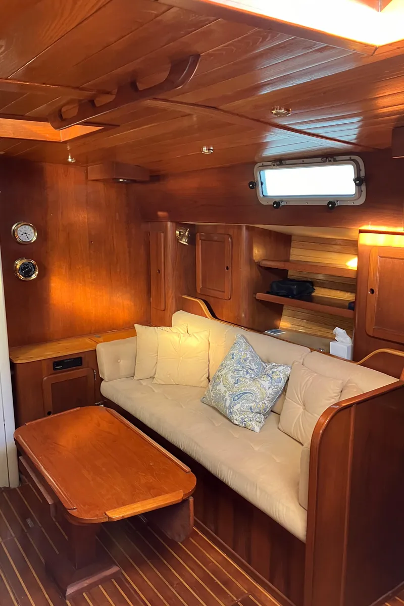 Slide: The Image of Cozy wooden interior of 1983 Morgan Nelson Marek 454 yacht with sofa and table. - 21