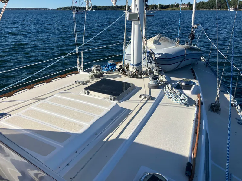 Slide: The Image of 1983 Morgan Nelson Marek 454 sailboat deck on calm water. - 5