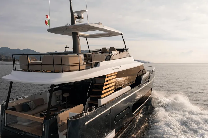 Slide: The Image of 2025 Azimut Magellano 60 yacht cruising on open water. - 20