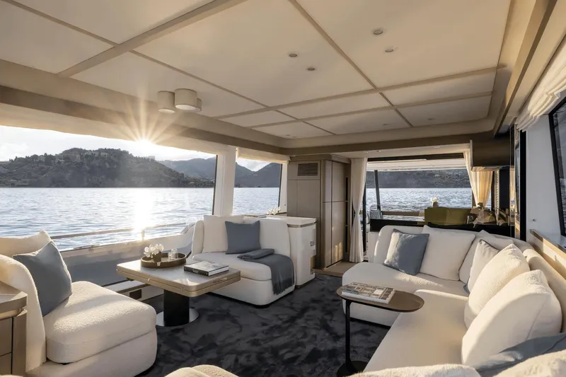 Slide: The Image of Luxurious interior of 2025 Azimut Magellano 60 yacht with scenic ocean view. - 38