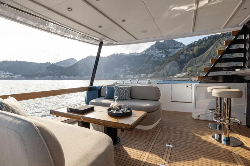 Slide: The Image of Luxurious 2025 Azimut Magellano 60 yacht interior with scenic ocean view. - 34