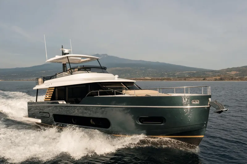 Slide: The Image of Azimut Magellano 60 yacht cruising on open water, 2025 model. - 21