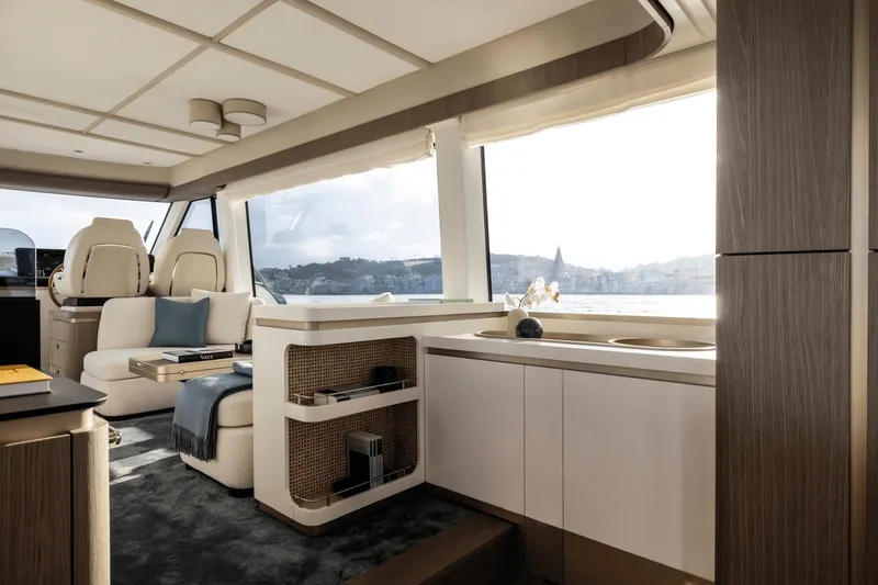 Slide: The Image of Luxurious interior of 2025 Azimut Magellano 60 yacht with panoramic windows and elegant furnishings. - 40