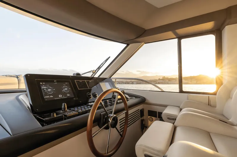 Slide: The Image of Luxurious 2025 Azimut Magellano 60 yacht helm with sunset view. - 44