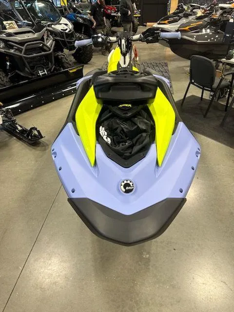 Slide: The Image of 2024 Sea-Doo Spark Trixx 3up with iBR and sound system on display. - 3