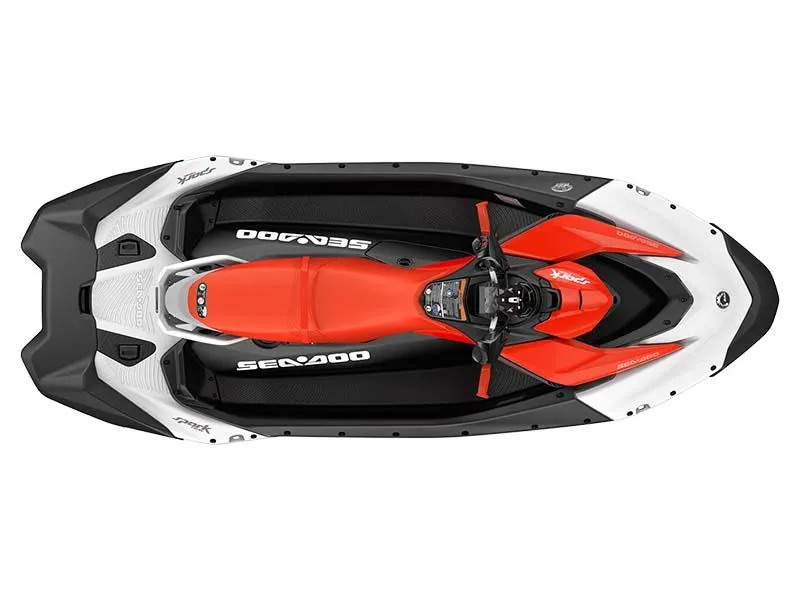 Slide: The Image of 2024 Sea-Doo SPARK TRIXX 3UP IBR, top view, vibrant red and black design. - 7