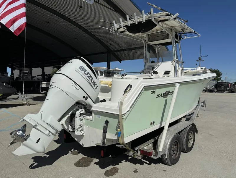 Slide: The Image of 2005 Sailfish 236 CC boat with Suzuki outboard motor on trailer. - 7