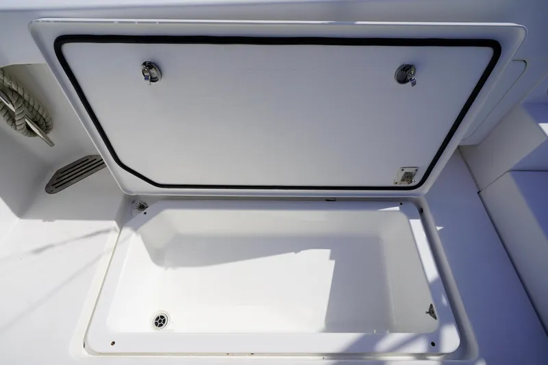 Slide: The Image of 2018 Bertram 35 Flybridge- IT-L-DO- Cockpit Storage - 25
