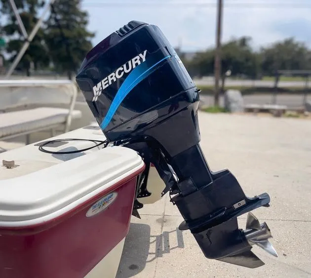 Slide: The Image of 2002 Bay Stealth 1880 BSVW boat with Mercury outboard motor. - 10