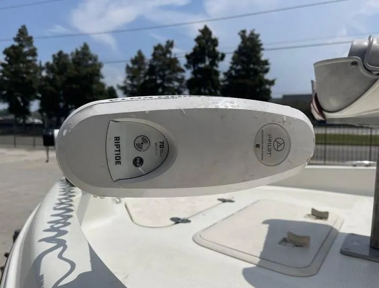 Slide: The Image of 2002 Bay Stealth 1880 BSVW boat with Riptide trolling motor, outdoors. - 11