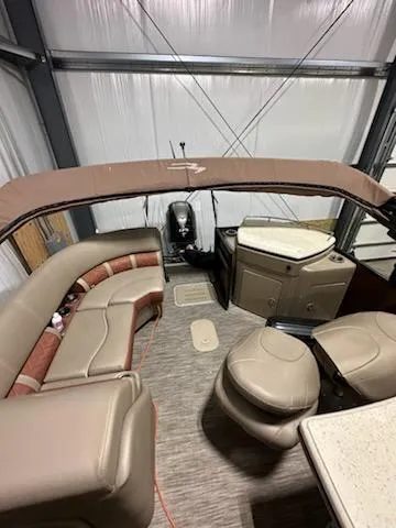 Slide: The Image of 2020 Bennington 23SPDXP pontoon boat interior with seating and helm station. - 3