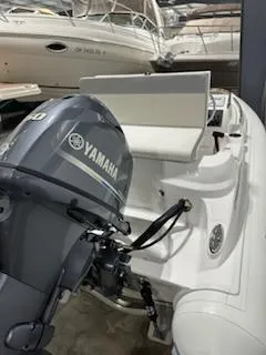 Slide: The Image of 2020 AB Inflatables 12dlx boat with Yamaha engine in storage. - 11