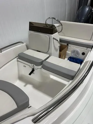 Slide: The Image of 2020 AB Inflatables 12dlx boat interior with seating and steering wheel. - 3