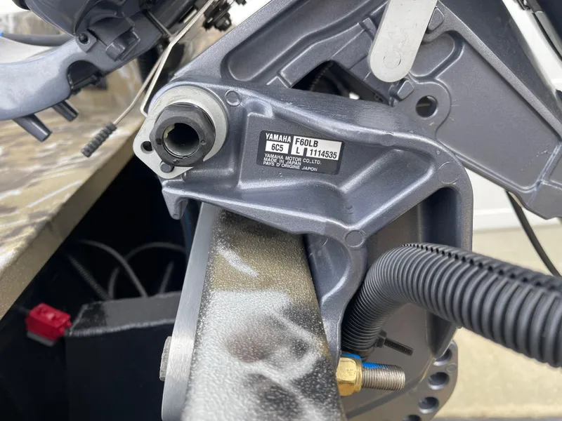 Slide: The Image of Close-up of 2025 Excel 1751 River Warrior boat engine component. - 15