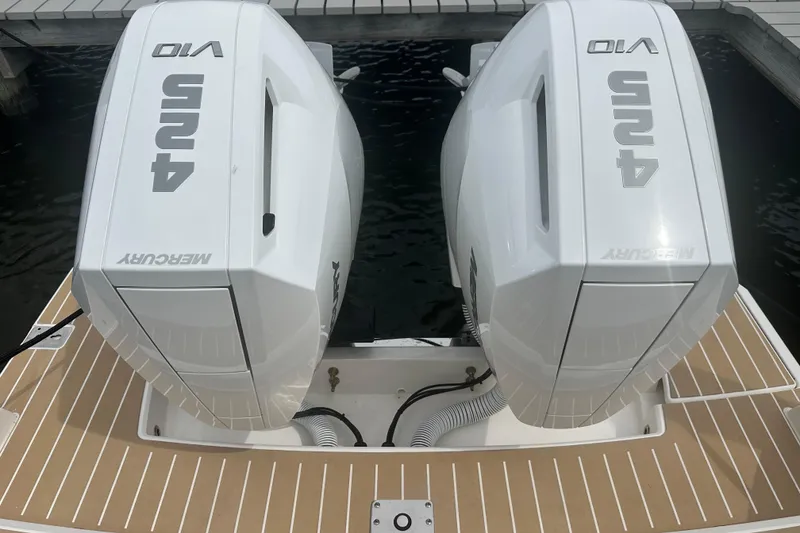 Slide: The Image of Twin Mercury 450R outboard engines on 2026 Tiara Yachts 34 LX boat. - 4