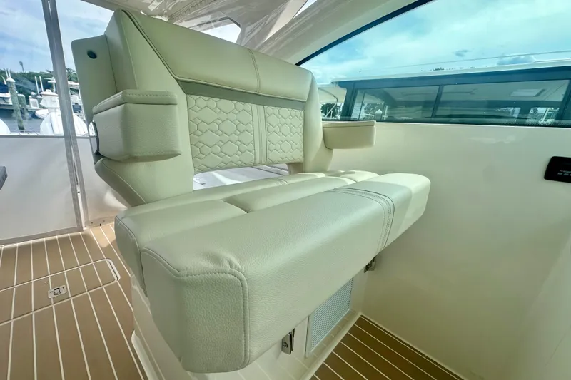 Slide: The Image of 2026 Tiara Yachts 34 LX interior with luxurious seating and modern design. - 6