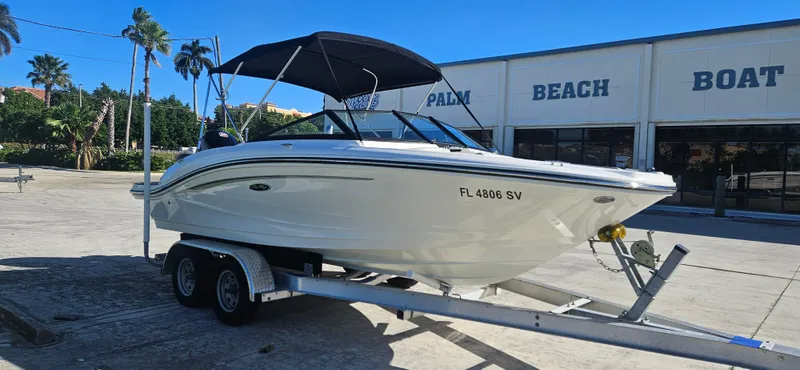Slide: The Image of 2021 Sea Ray SPX 190 OB boat on trailer at Palm Beach dealership. - 2