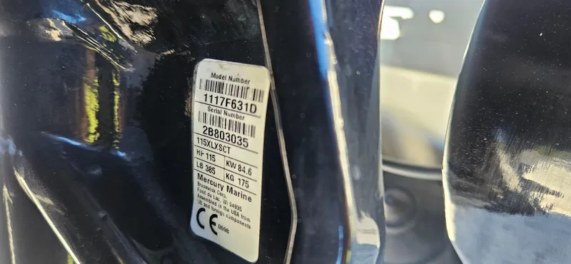 Slide: The Image of Close-up of a Mercury Marine engine label on a 2021 Sea Ray SPX 190 OB. - 20