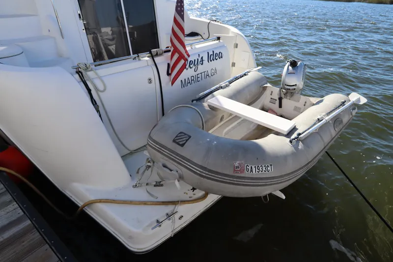 Slide: The Image of 2005 Meridian 459 Motoryacht with dinghy, docked in Marietta, GA. - 11