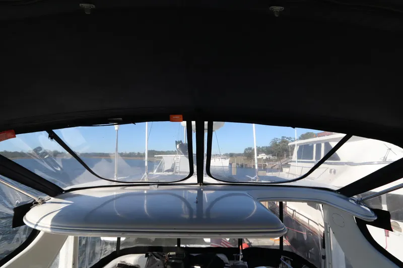 Slide: The Image of Interior view of 2005 Meridian 459 Motoryacht with panoramic windows. - 29